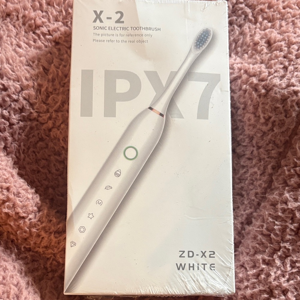 White Sonic Electric Toothbrush